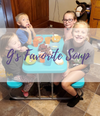 The four older kids eating their soup.